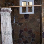 The shower. The stone makes a good, non-slippery surface.