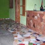 Notice the colorful tile work all around the room.